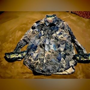 Lightly worn and beautifully cared for, shirt that makes a statement!